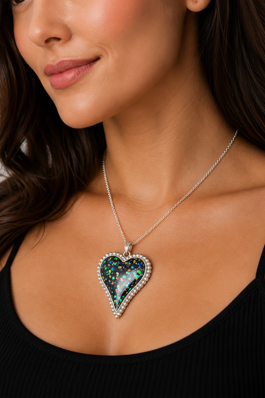 Black holographic glitter heart pendant on model